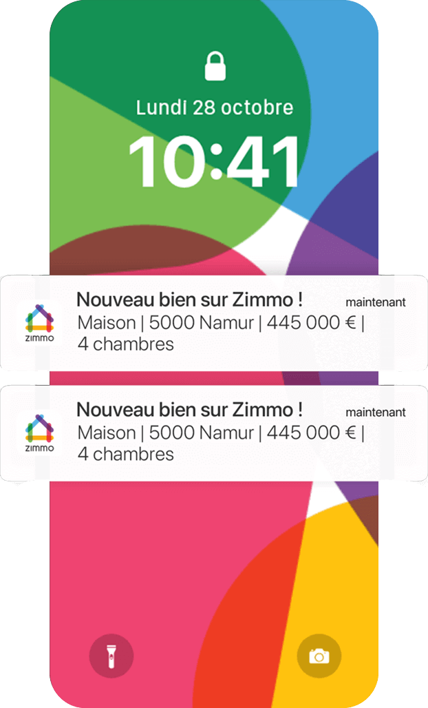 Écran du smartphone affichant les notifications push avec les nouvelles maisons de l'application Zimmo Écran du smartphone affichant les notifications push avec les nouvelles maisons de l'application Zimmo